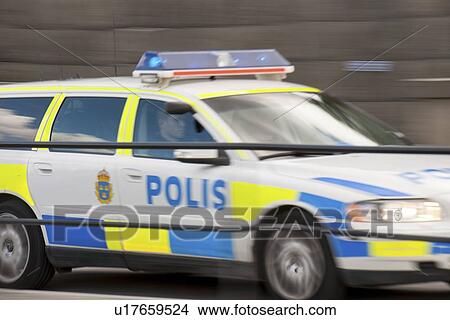 Police car patrolling on the road, Stockholm, Sweden View Large Photo Image Picture - Police car patrolling on the road, Stockholm, Sweden. Fotosearch