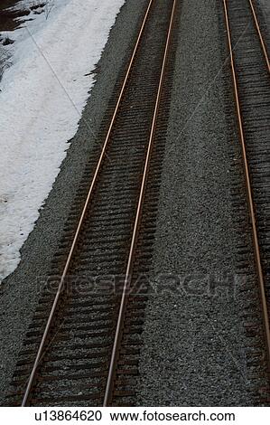 Stock Image - Railroad tracks in winter, Whistler, British Columbia, Canada. Fotosearch