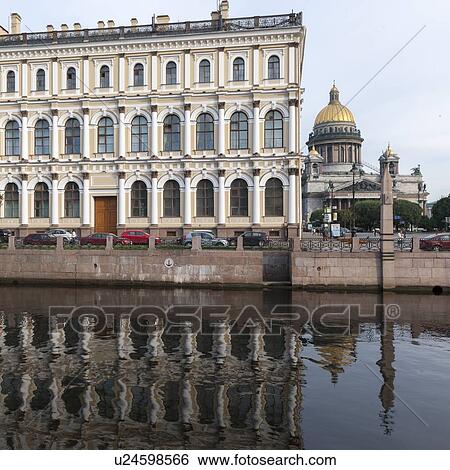 Stock Photograph - Reflection of Mariinsky Palace in the Moyka River, St. Petersburg, Russia. Fotosearch