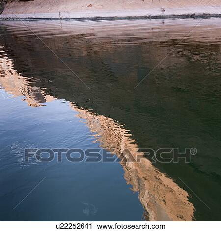Reflection of rock in water, Glen Canyon National Recreation Area, Colorado River Float Trip, Colorado River, Arizona-Utah, USA View Large Photo Image Stock Image - Reflection of rock in water, Glen Canyon National Recreation Area, Colorado River Float Trip, Colorado River, Arizona-Utah, USA. Fotosearch