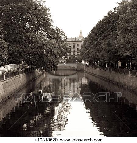 Stock Image - Reflection of trees in the Kryukov Canal, St. Petersburg, Russia. Fotosearch