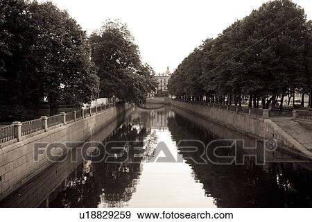 Reflection of trees in the Kryukov Canal, St. Petersburg, Russia View Large Photo Image Stock Photo - Reflection of trees in the Kryukov Canal, St. Petersburg, Russia. Fotosearch