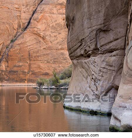 Stock Photo - River flowing through a canyon, Glen Canyon National Recreation Area, Colorado River Float Trip, Colorado River, Arizona-Utah, USA. Fotosearch