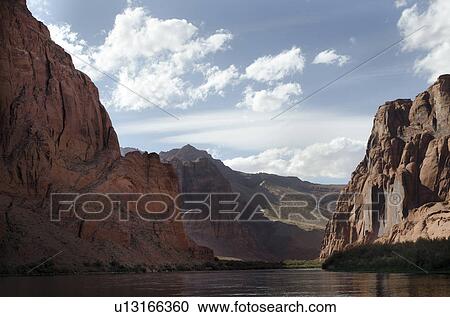 River flowing through rocks, Colorado River, Glen Canyon National Recreation Area, Arizona-Utah, USA View Large Photo Image Stock Image - River flowing through rocks, Colorado River, Glen Canyon National Recreation Area, Arizona-Utah, USA. Fotosearch