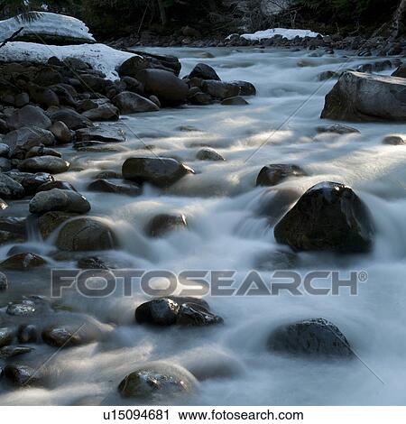 Stock Image - River flowing through rocks, Whistler, British Columbia, Canada. Fotosearch