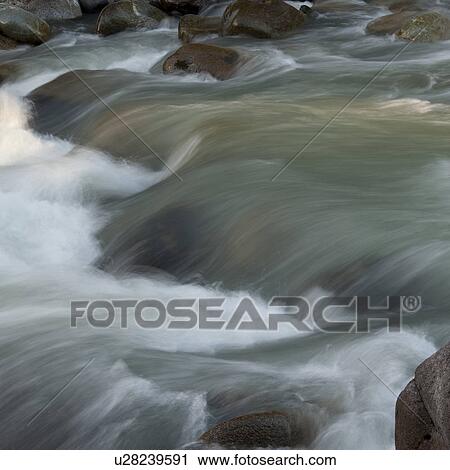 River flowing through rocks, Whistler, British Columbia, Canada View Large Photo Image Stock Image - River flowing through rocks, Whistler, British Columbia, Canada. Fotosearch