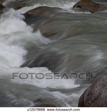 River flowing through rocks, Whistler, British Columbia, Canada View Large Photo Image Stock Photo - River flowing through rocks, Whistler, British Columbia, Canada. Fotosearch