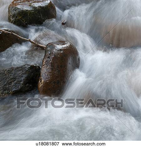 River flowing through rocks, Whistler, British Columbia, Canada View Large Photo Image Stock Photo - River flowing through rocks, Whistler, British Columbia, Canada. Fotosearch