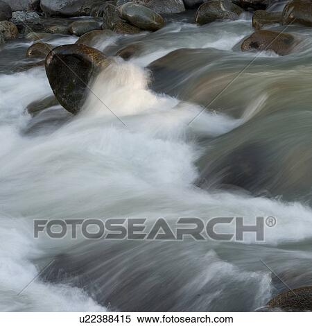 Stock Photography - River flowing through rocks, Whistler, British Columbia, Canada. Fotosearch