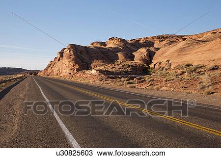 Stock Image - Road passing through a landscape, U. S. Route 89, Utah, USA. Fotosearch