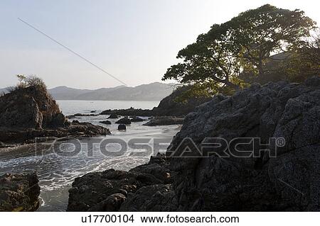 Picture - Rock formation at the coast, Sayulita, Nayarit, Mexico. Fotosearch