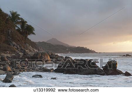 Stock Image - Rock formation at the coast, Sayulita, Nayarit, Mexico. Fotosearch
