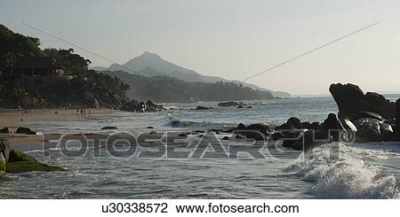 Stock Image - Rock formations at the coast, Sayulita, Nayarit, Mexico. Fotosearch