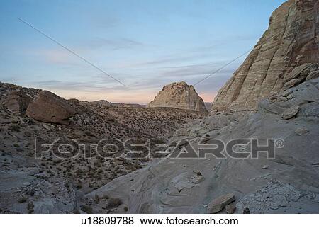 Stock Photo - Rock formations in a desert, Amangiri, Canyon Point, Hoodoo Trail, Utah, USA. Fotosearch