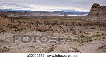 Stock Photograph - Rock formations on a landscape, Amangiri, Canyon Point, Utah, USA. Fotosearch