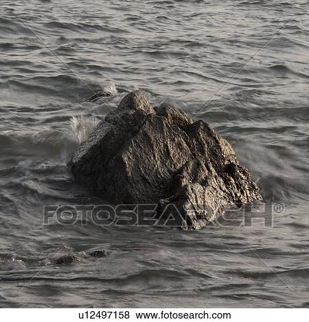 Rock in the sea, Sayulita, Nayarit, Mexico View Large Photo Image Stock Photo - Rock in the sea, Sayulita, Nayarit, Mexico. Fotosearch
