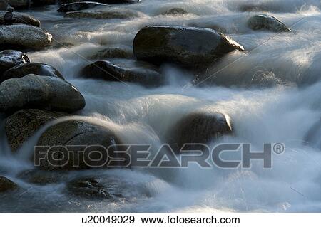Stock Photo - Rocks in the river, Whistler, British Columbia, Canada. Fotosearch