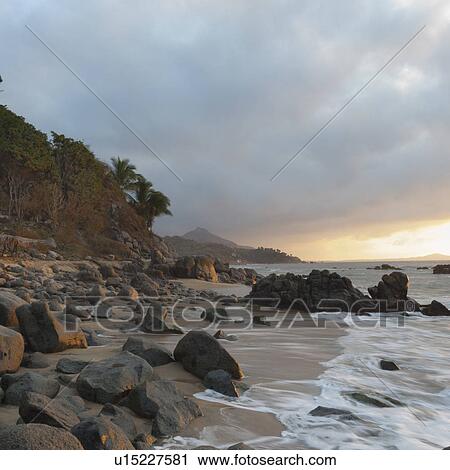 Stock Image - Rocks on the beach, Sayulita, Nayarit, Mexico. Fotosearch