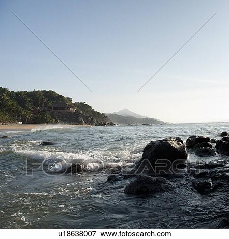Stock Photo - Rocks on the beach, Sayulita, Nayarit, Mexico. Fotosearch