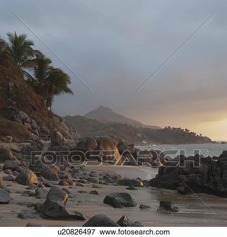 Rocks on the beach, Sayulita, Nayarit, Mexico View Large Photo Image Stock Photo - Rocks on the beach, Sayulita, Nayarit, Mexico. Fotosearch