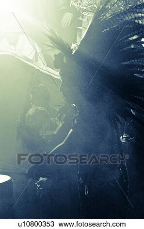 Stock Image - Silhouette of native American statues in sunlight, Sayulita, Nayarit, Mexico. Fotosearch