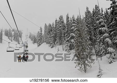 Ski lift at snowy valley in winter, Whistler, British Columbia, Canada View Large Photo Image Stock Photograph - Ski lift at snowy valley in winter, Whistler, British Columbia, Canada. Fotosearch