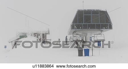 Picture - Ski lift terminal in winter, Whistler Mountain, Whistler, British Columbia, Canada. Fotosearch