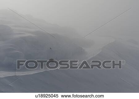 Stock Photography - Ski resort covered with fog, Whistler, British Columbia, Canada. Fotosearch