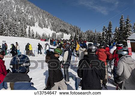 Stock Photo - Skiers at Symphony Amphitheatre, Whistler, British Columbia, Canada. Fotosearch