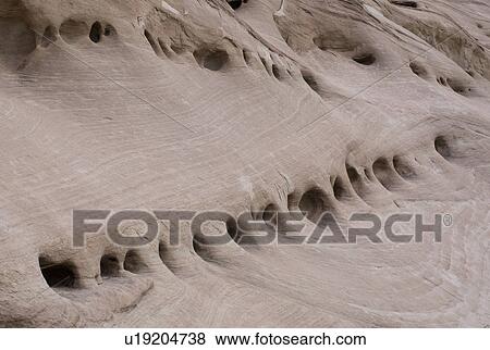 Stock Photo - Small caves, Amangiri, Canyon Point, Hoodoo Trail, Utah, USA. Fotosearch