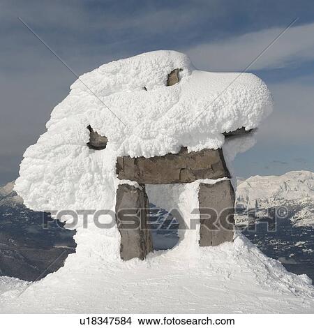 Picture - Snow covered inuksuk, Whistler, British Columbia, Canada. Fotosearch