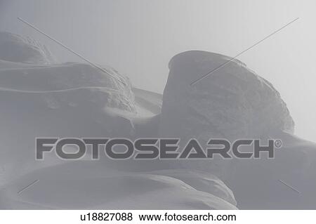 Snow covered mountain surrounded with fog, Whistler, British Columbia, Canada View Large Photo Image Stock Photo - Snow covered mountain surrounded with fog, Whistler, British Columbia, Canada. Fotosearch
