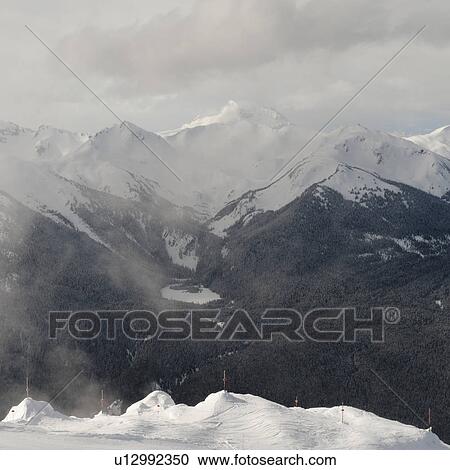 Stock Image - Snow covered mountains, Whistler, British Columbia, Canada. Fotosearch