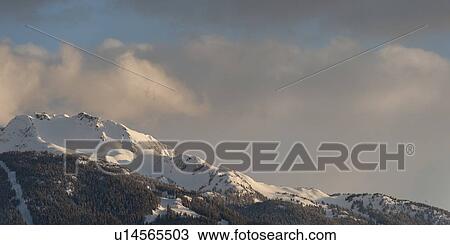 Stock Image - Snow covered mountains, Whistler, British Columbia, Canada. Fotosearch