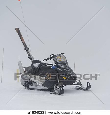 Snowmobile parked on snow, Symphony Amphitheatre, Whistler, British Columbia, Canada View Large Photo Image Stock Image - Snowmobile parked on snow, Symphony Amphitheatre, Whistler, British Columbia, Canada. Fotosearch