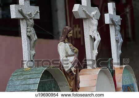 Picture - Statue of Jesus Christ with crucifixes, Sayulita, Nayarit, Mexico. Fotosearch
