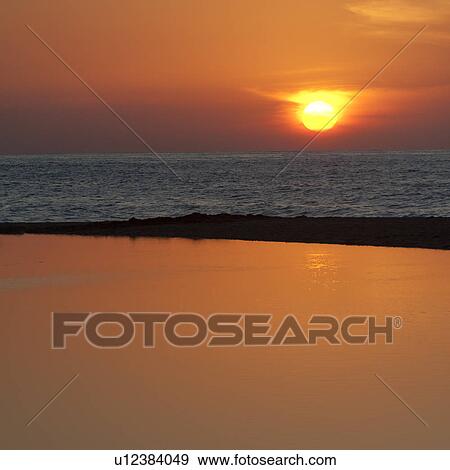 Sunset over the sea, Sayulita, Nayarit, Mexico View Large Photo Image Stock Photo - Sunset over the sea, Sayulita, Nayarit, Mexico. Fotosearch