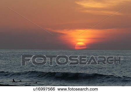 Stock Photograph - Sunset over the sea, Sayulita, Nayarit, Mexico. Fotosearch