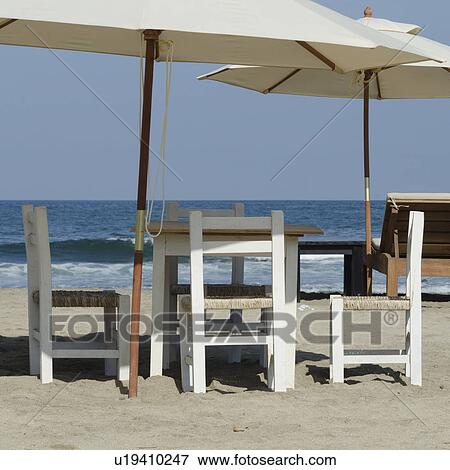 Tables and chairs on the beach, Sayulita, Nayarit, Mexico View Large Photo Image Stock Photo - Tables and chairs on the beach, Sayulita, Nayarit, Mexico. Fotosearch