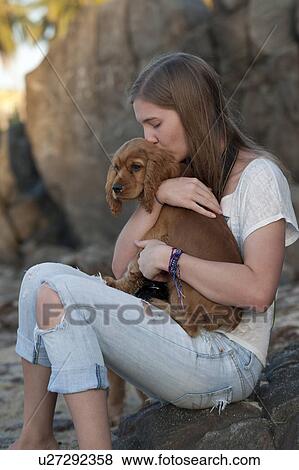 Teenage girl kissing a dog, Sayulita, Nayarit, Mexico View Large Photo Image Stock Photo - Teenage girl kissing a dog, Sayulita, Nayarit, Mexico. Fotosearch