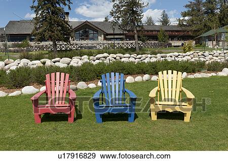 Three Adirondack chairs in the lawn of Fairmont Jasper Park Lodge, Jasper National Park, Alberta, Canada View Large Photo Image Stock Photo - Three Adirondack chairs in the lawn of Fairmont Jasper Park Lodge, Jasper National Park, Alberta, Canada. Fotosearch