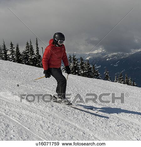 Stock Photo - Tourist skiing, Whistler, British Columbia, Canada. Fotosearch