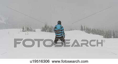 Tourist snowboarding, Symphony Amphitheatre, Whistler, British Columbia, Canada View Large Photo Image Stock Photograph - Tourist snowboarding, Symphony Amphitheatre, Whistler, British Columbia, Canada. Fotosearch