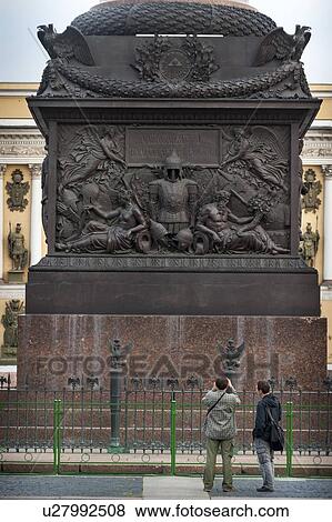 Tourist taking a picture of Alexander Column, Winter Palace, State Hermitage Museum, Palace Square, St. Petersburg, Russia View Large Photo Image Stock Photo - Tourist taking a picture of Alexander Column, Winter Palace, State Hermitage Museum, Palace Square, St. Petersburg, Russia. Fotosearch
