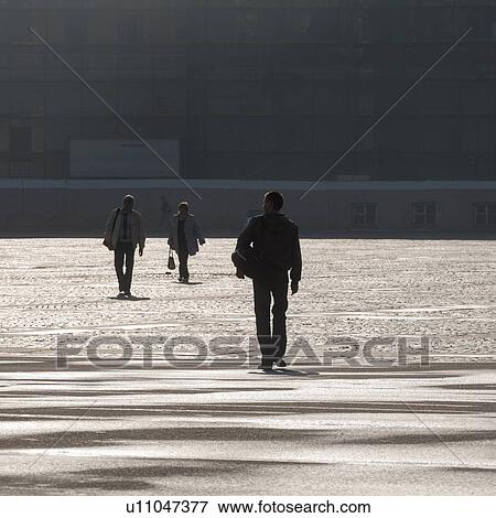 Stock Photo - Tourists in front of the Winter Palace, State Hermitage Museum, Palace Square, St. Petersburg, Russia. Fotosearch
