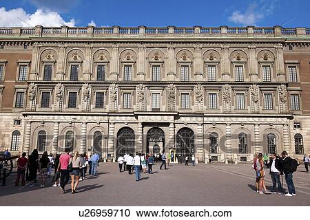 Stock Image - Tourists in the Stockholm Palace, Gamla Stan, Stockholm, Sweden. Fotosearch