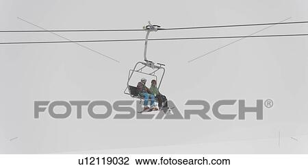 Tourists on a ski lift, Symphony Amphitheatre, Whistler, British Columbia, Canada View Large Photo Image Stock Image - Tourists on a ski lift, Symphony Amphitheatre, Whistler, British Columbia, Canada. Fotosearch