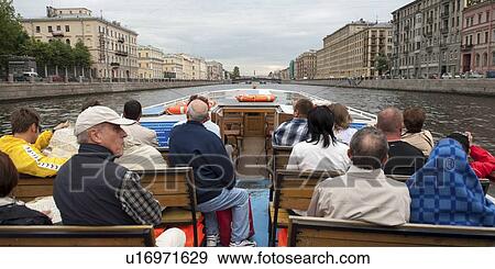 Tourists on a tourboat, Fontanka River, St. Petersburg, Russia View Large Photo Image Stock Photo - Tourists on a tourboat, Fontanka River, St. Petersburg, Russia. Fotosearch