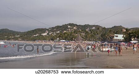 Tourists on the beach, Sayulita, Nayarit, Mexico View Large Photo Image Stock Image - Tourists on the beach, Sayulita, Nayarit, Mexico. Fotosearch