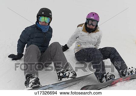 Tourists resting with snowboards, Whistler, British Columbia, Canada View Large Photo Image Picture - Tourists resting with snowboards, Whistler, British Columbia, Canada. Fotosearch